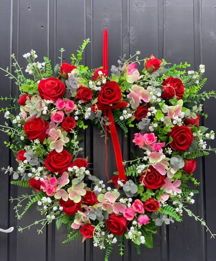 Valentines roses heart wreath design in red, pink and white.