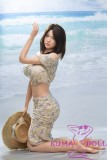 Top Sino Doll posing by the seaside