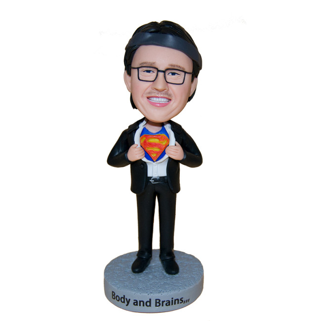 Custom bobblehead:A business man with a dream of being a superman