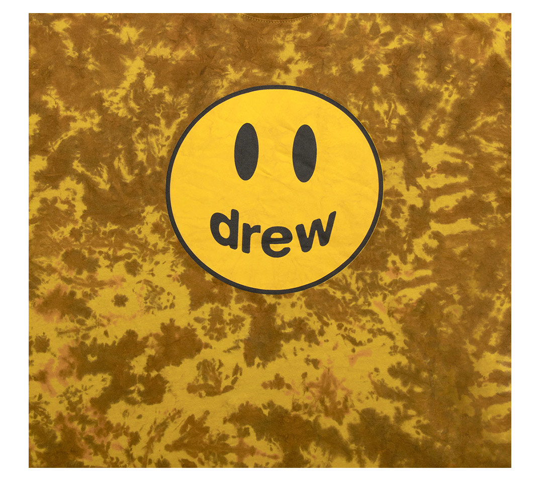 Drew house mascot smiling face tie dyed brown couple high street 