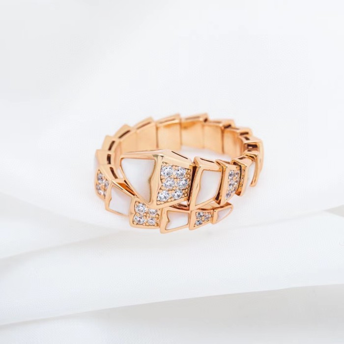 Serpentine diamond ring