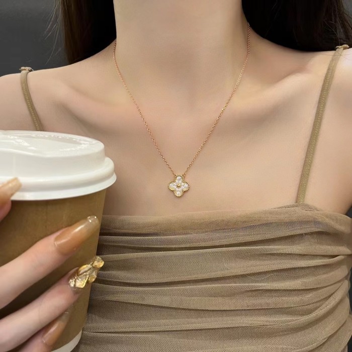Fourleaf two-color diamond necklace