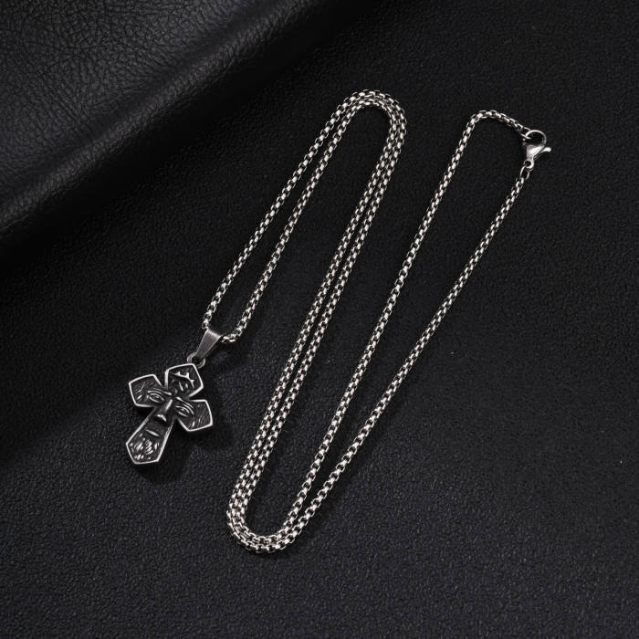 Wholesale Stainless Steel Abstract Face Cross Pendant