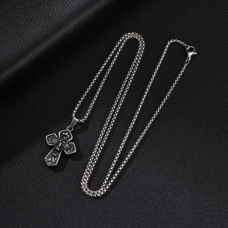 Wholesale Stainless Steel Abstract Face Cross Pendant