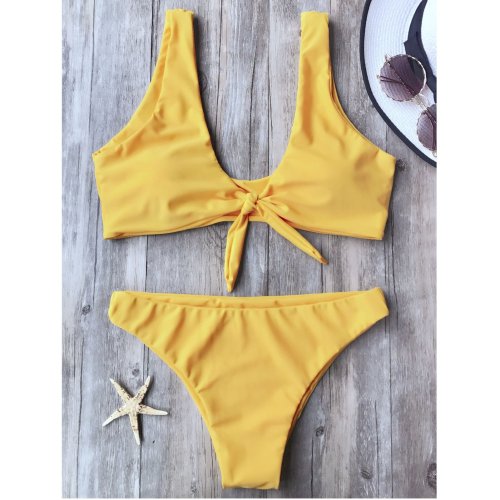 A Two-Piece Bathing Suit With A Solid Color Chest