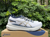Asics Gel-Kayano 31 white and blue and yellow 