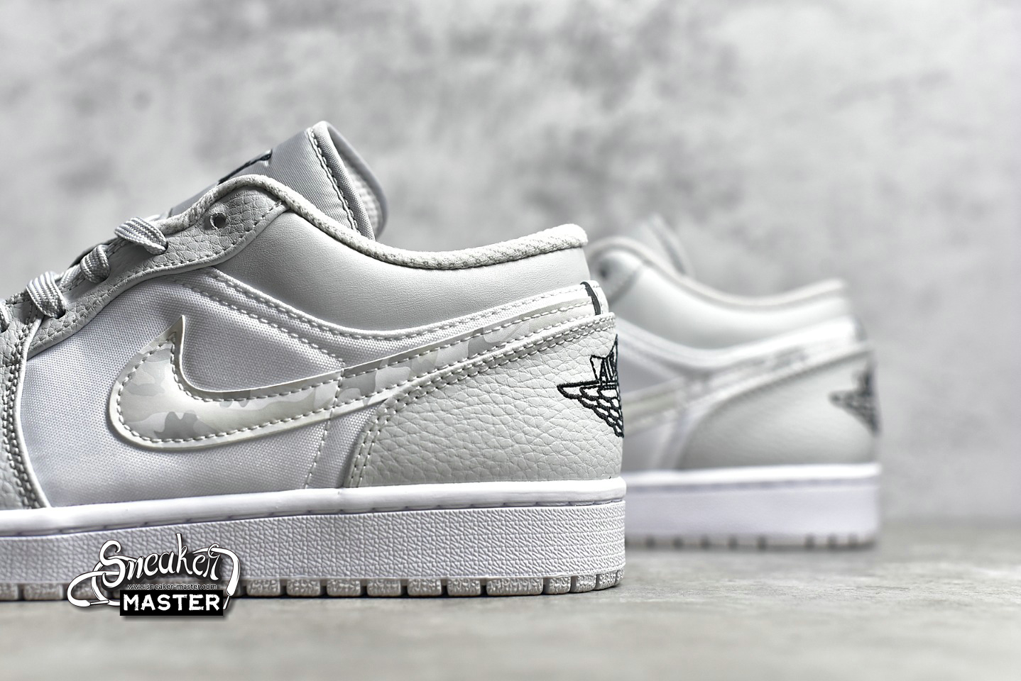 air jordan 1 low features soft grey camo swooshes
