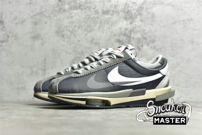 NIKE ZOOM CORTEZ 4.0 SP OG ROYAL FUCHSIA X SACAI NAVY/SORT DQ0581-001