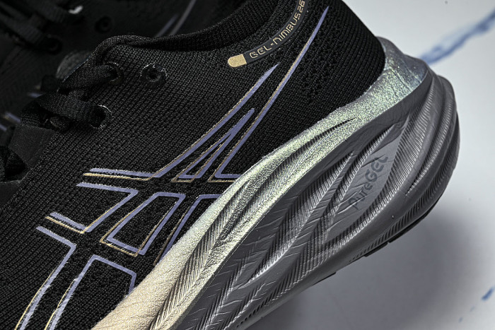 1011B922-001 GEL-NIMBUS 26 PLATINUM BLACK/CHAMPAGNE