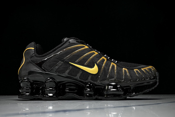 AV3595 -013 SHOX TL BLACK/UNIVERSITY GOLD