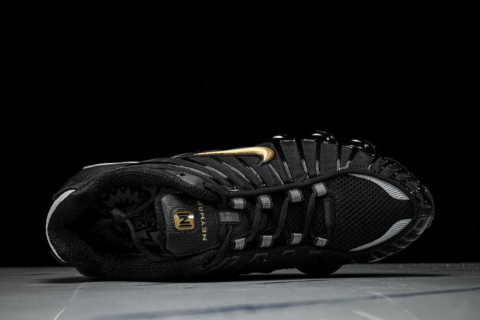 BV1388- 001 SHOX TL BLACK/METALLIC GOLD-METALLIC SILVER