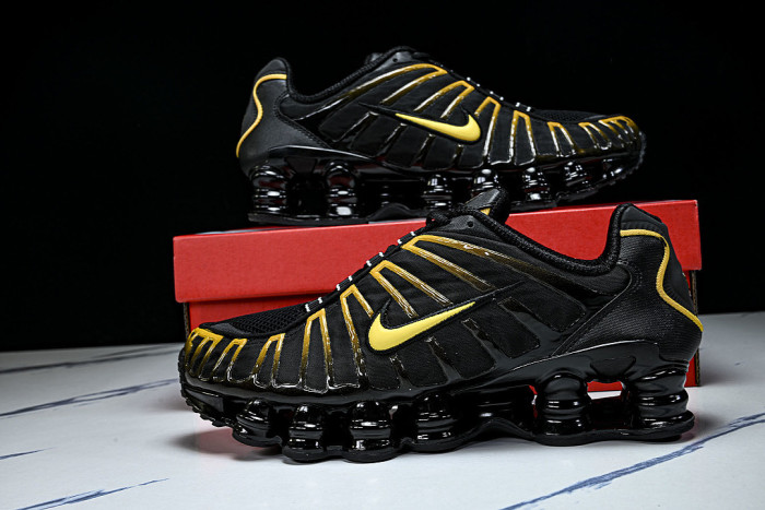 AV3595 -013 SHOX TL BLACK/UNIVERSITY GOLD
