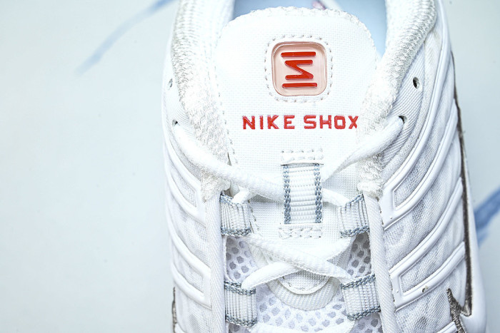 AV3595-100 SHOX TL WHITE/METALLIC SILVER-MAX ORANGE-WHITE