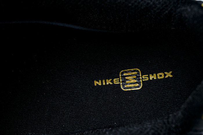 AV3595 -013 SHOX TL BLACK/UNIVERSITY GOLD