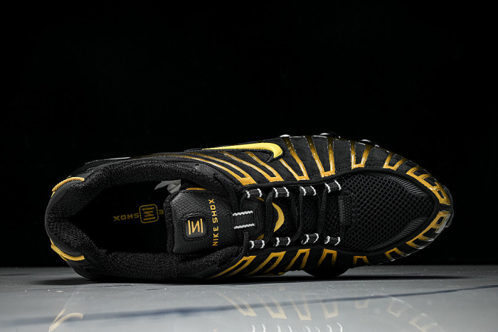 AV3595 -013 SHOX TL BLACK/UNIVERSITY GOLD