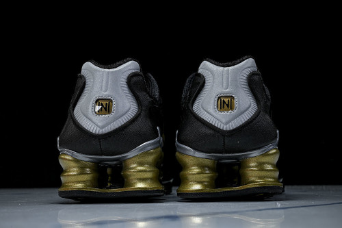 BV1388- 001 SHOX TL BLACK/METALLIC GOLD-METALLIC SILVER