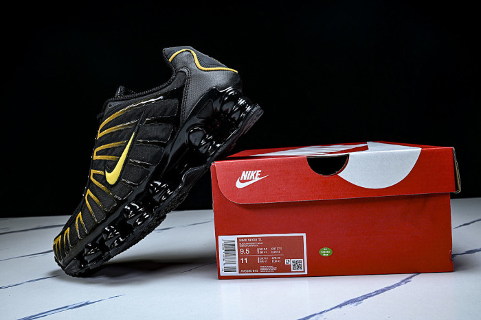 AV3595 -013 SHOX TL BLACK/UNIVERSITY GOLD