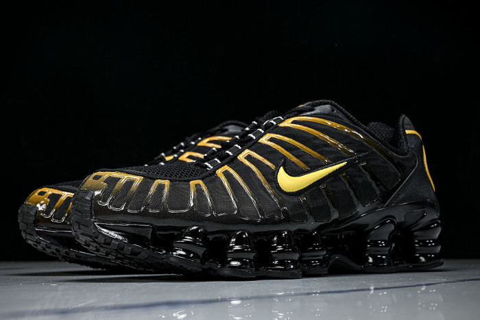 AV3595 -013 SHOX TL BLACK/UNIVERSITY GOLD