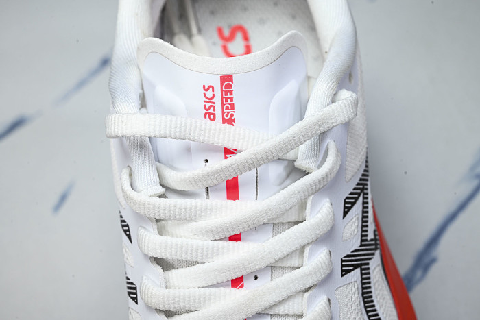 1012B518-100 MAGIC SPEED 4 WHITE/BLACK/ORANGE