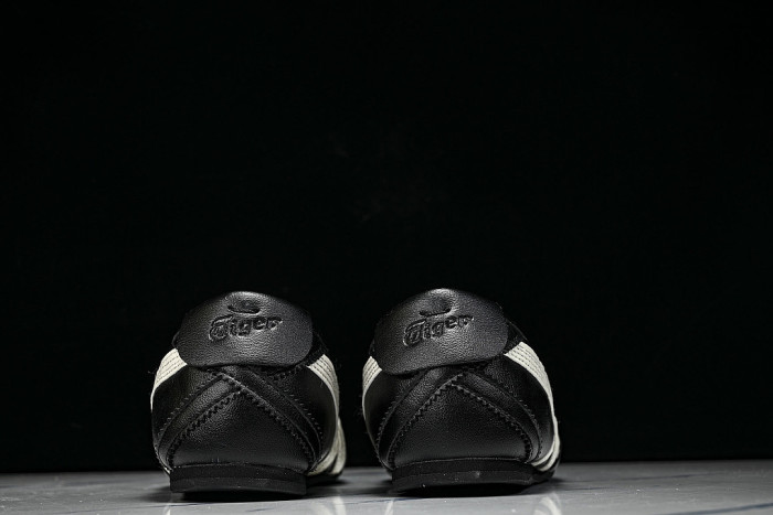 1182A704-001 GYMNARINA BLACK/CREAM