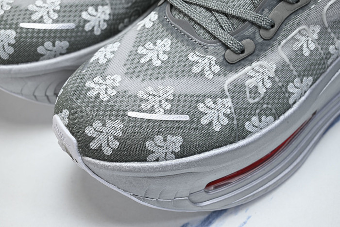 IQ0028-001 VOMERO PREMIUM QS GEYSER GREY/METALLIC SILVER/DARK STEEL GREY/PEONY