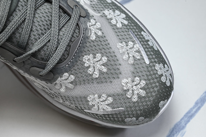 IQ0028-001 VOMERO PREMIUM QS GEYSER GREY/METALLIC SILVER/DARK STEEL GREY/PEONY