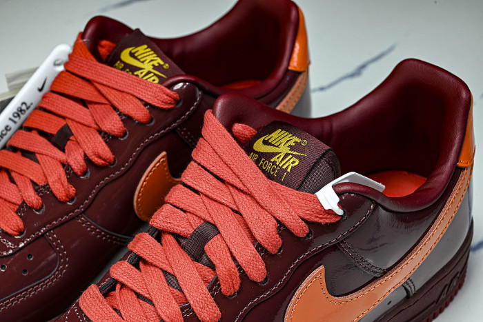 IO4489-601 AIR FORCE 1 07 LOW CASUAL SNEAKERS WINE RED/ORANGE