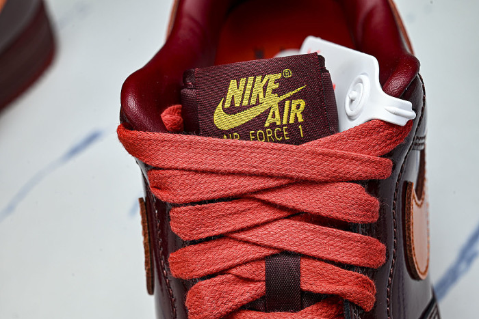 IO4489-601 AIR FORCE 1 07 LOW CASUAL SNEAKERS WINE RED/ORANGE