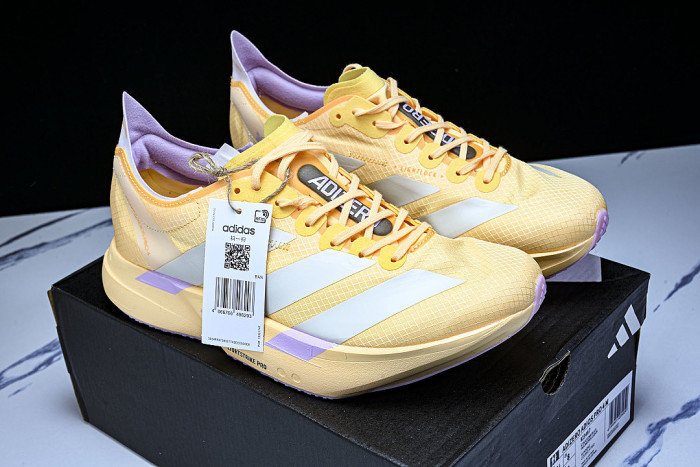 KI3467 ADIZERO ADIOS PRO 4 ICE TANGERINE/ICE GOLD METALLIC/BLISS LILAC