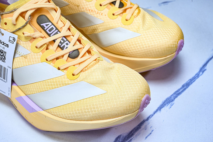 KI3467 ADIZERO ADIOS PRO 4 ICE TANGERINE/ICE GOLD METALLIC/BLISS LILAC