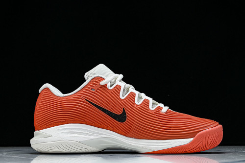 IB6555-100 COURT AIR ZOOM VAPOR 12 HC SAIL/TURF ORANGE/BLUE RIBBON HEATHER/BLACK