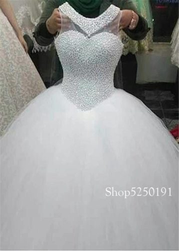 Exquisite Tulle Jewel Neckline Ball Gown Wedding Dresses With Pearls Beading Sleeveslss Crystals Bridal Gowns