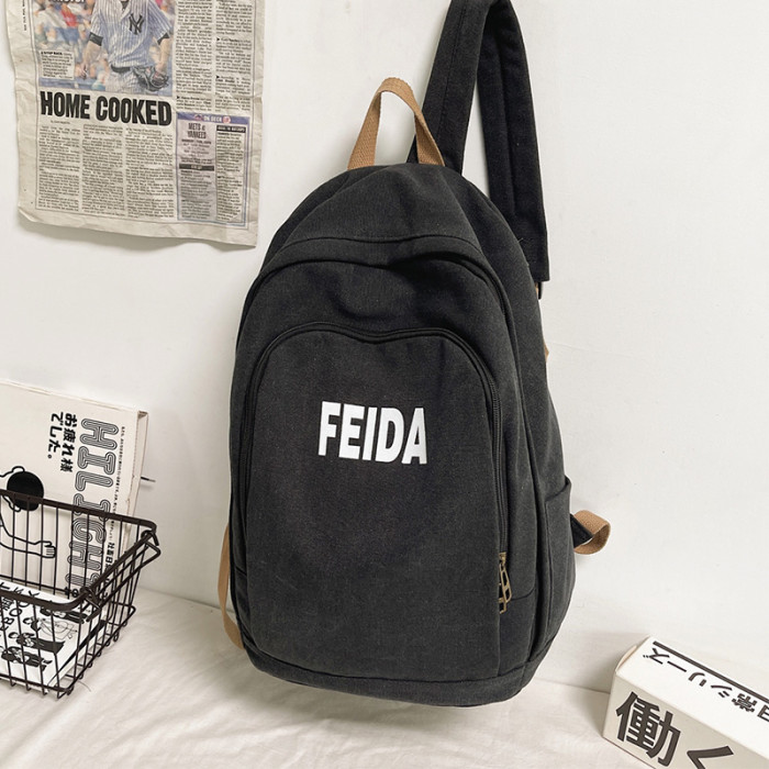 Solid canvas backpack Fashion casual unisex large-capacity travel backpack Retro college style schoolbag for young men and women
