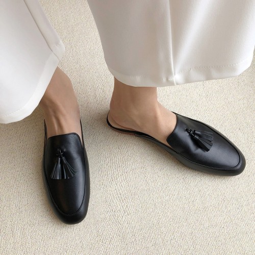 Fashion women's cowhide round toe flat bottom tassel slippers low heeled shoes