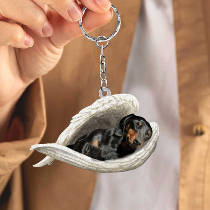 Black and tan dachshund Sleeping Angel Acrylic Keychain | Shop Now