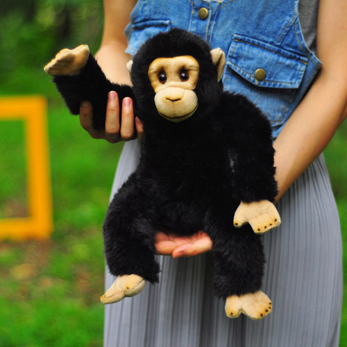 Realistic chimp plush doll