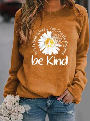 In A World Where You Can Be Anything Be Kind Daisy Print Long Sleeve Crew Neck Sweatshirt