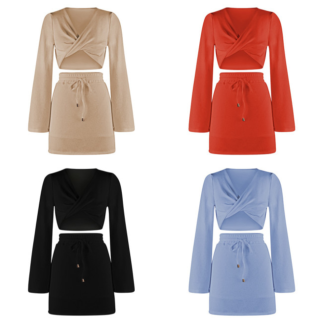 Solid color twisted long-sleeved V-neck top and drawstring skirt suit