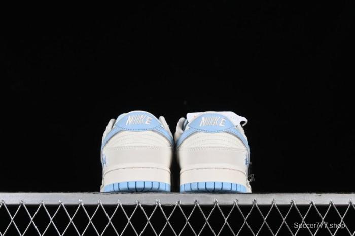 Stussy x Nike Dunk Low SB Skate Shoes in White with Light Blue Swoosh - DQ1098-380