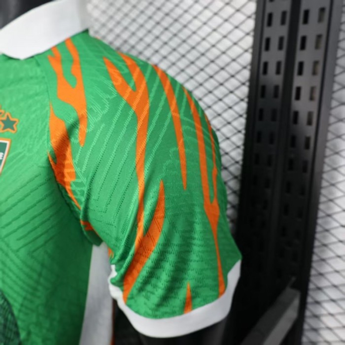 Player Version 2025 Ivory Coast Green with Elephant Graphic and Orange Trim Jersey