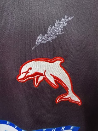 25/26 Redcliffe Dolphins Black with Sunset Pyramid Indigenous Jersey