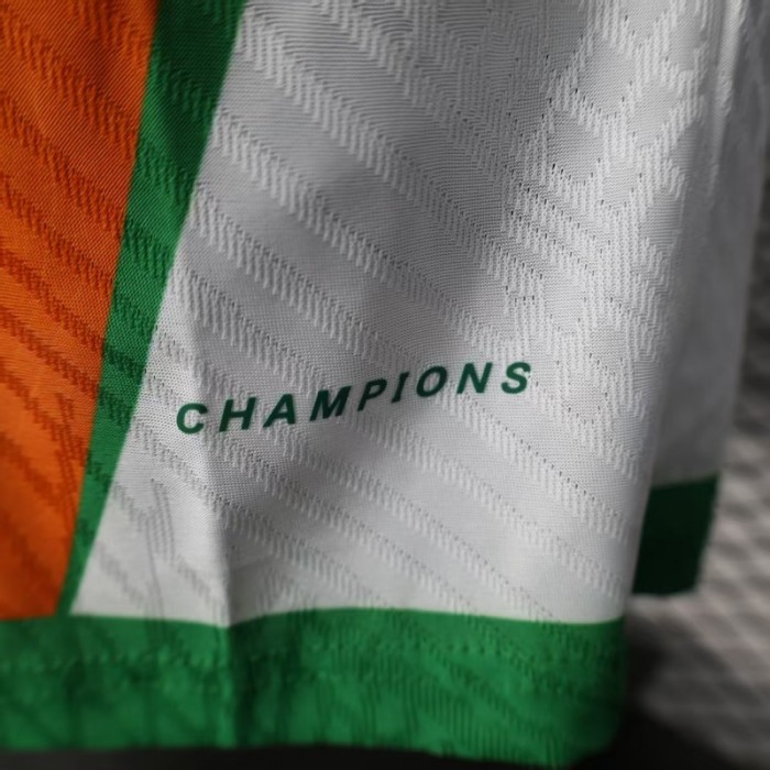 Player Version 2025 Ivory Coast Orange with Elephant Graphic and Green Accents Jersey