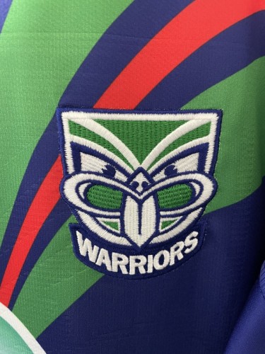 25/26 New Zealand Warriors Navy Blue with Green and Red Diagonal Stripes and Circular Gradient Heritage Jersey