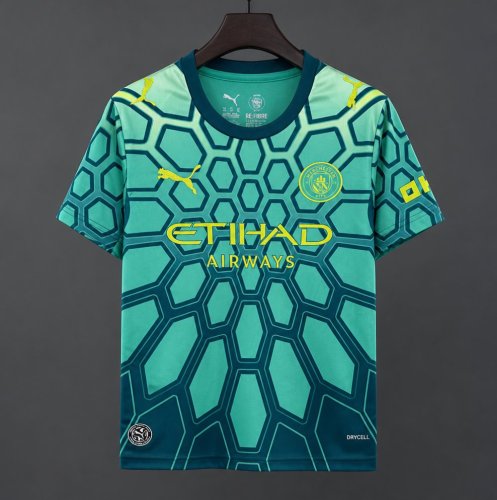 26/27 Manchester City Vibrant Green Goalkeeper Jersey With Dark Blue Geometric Pattern.