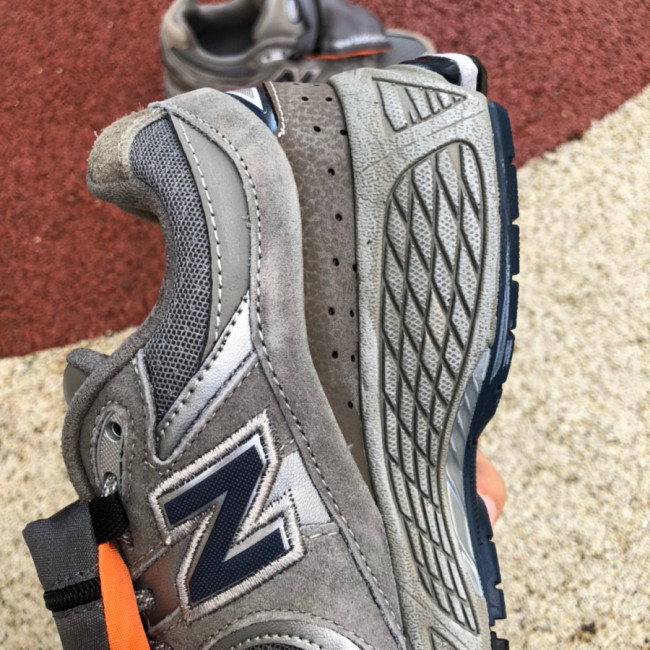 New Balance 2002R Grey Brown Pouch