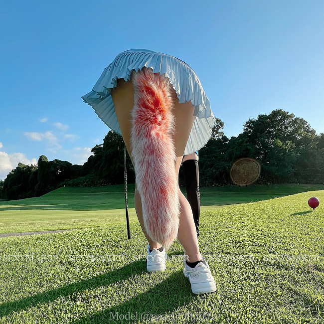 リボン付きのふわふわな尻尾付きのアナルプラグ オレンジ
