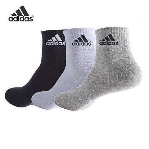 Three pairs of Adidas socks