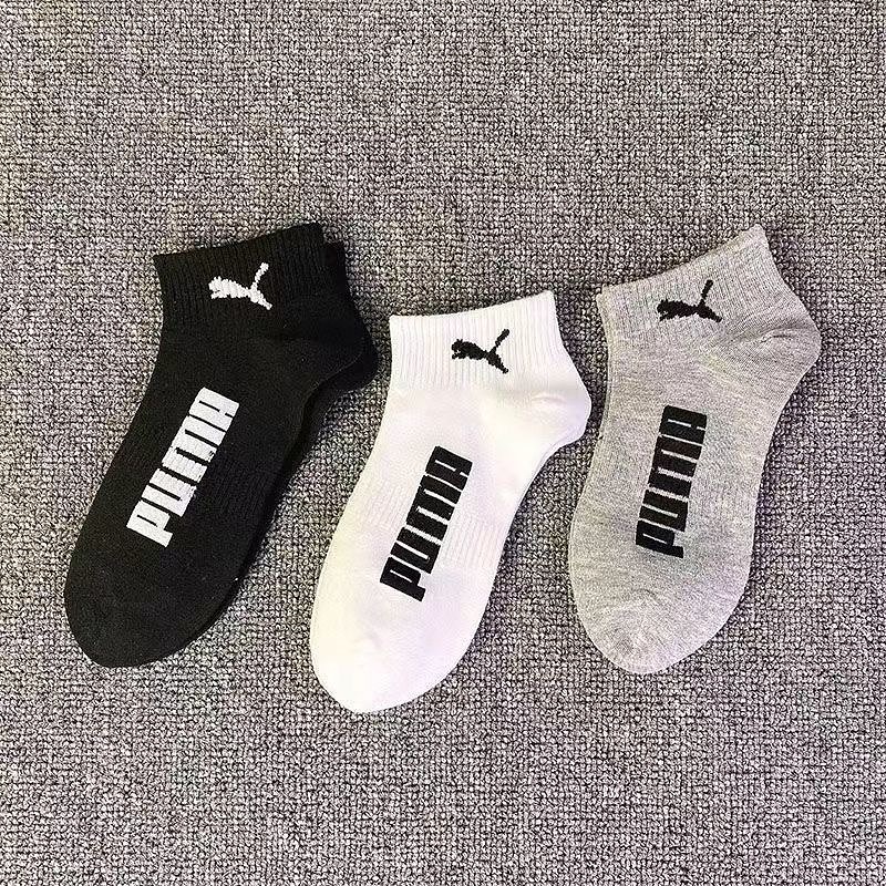 A pair of PUMA socks, random colors