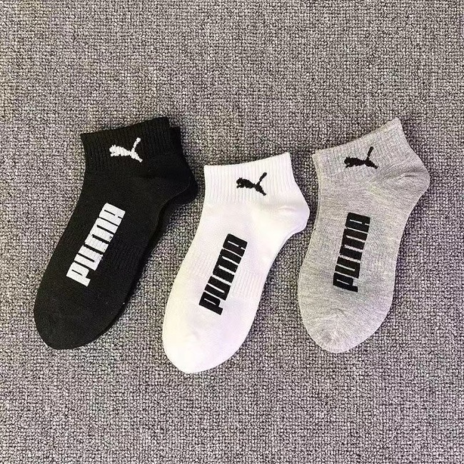 A pair of PUMA socks, random colors