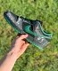 There Skateboards × Nike SB Dunk Low